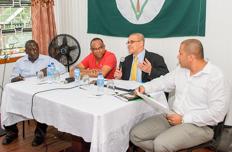 GRA Commissioner- General, Godfrey Statia, makes a point at the meeting on Tuesday afternoon as officials of the GGDMA look on.