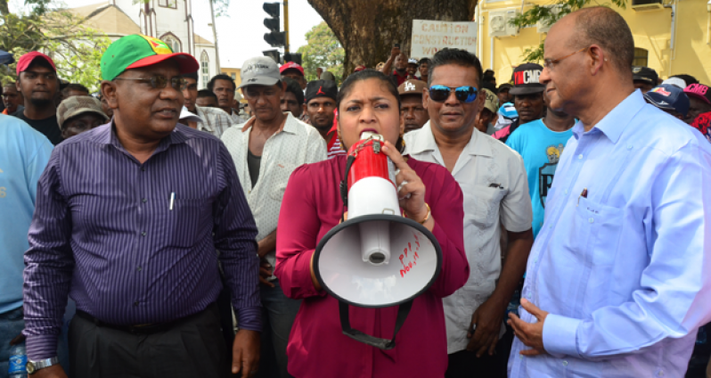 ‘ALWAYS ON THE SIDE OF WORKERS’: PPPC Members Priya Manickchand, Clement Rohee, Zulfikar Mustapha and Faizal Jafarally were among those speaking to protesting sugar workers outside Public Buildings on Wednesday.