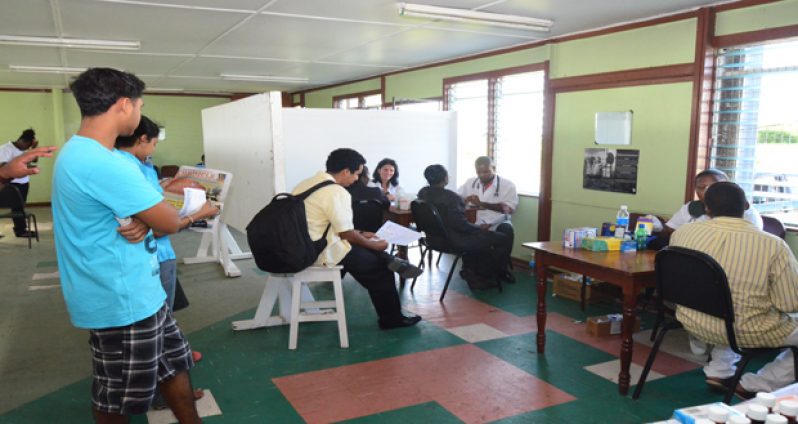 Persons taking advantage of the services offered at the health and wellness fair