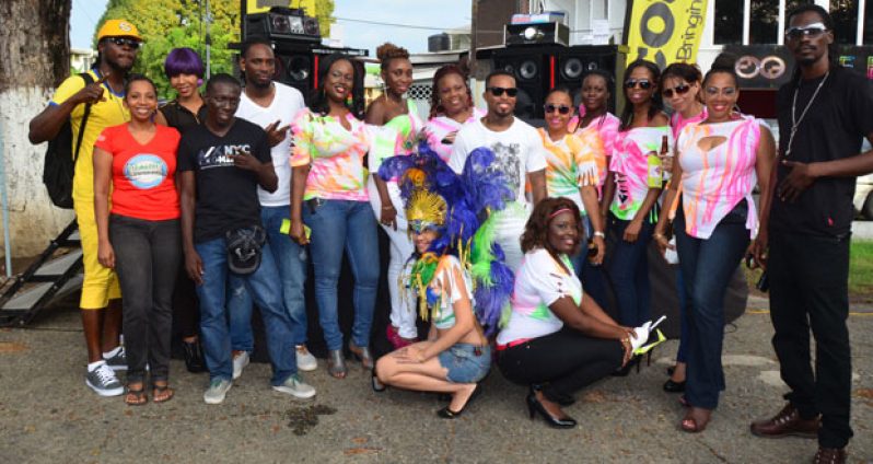 Soca artistes and Courts Guyana staff