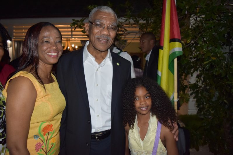 President David Granger with some of the Guyanese living in the Bahamas.