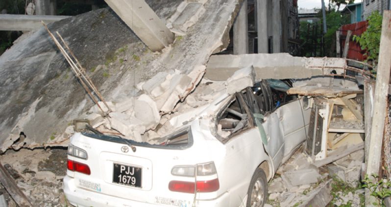 The car trapped under the rubble from the fallen concrete structure (Cullen Bess-Nelson photo)