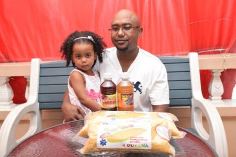 Edson Sam and his beautiful daughter Kataleya. The products are named after her.