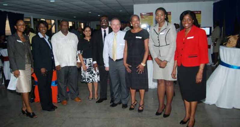 Key stakeholders at the ACP-GBCHA Launch
From left):  Suzanne French and Tracey Lewis (GBCHA); Derrick  Cummings, Private Sector stakeholder;  Dr. Shanti Singh (NAPS);  Derrick Springer, PANCAP;  Dr. Oleksander Chericas (USAID), Folami Harris (ACP);  Oneica Johnson (Citizens Bank); Edris George (USAID)