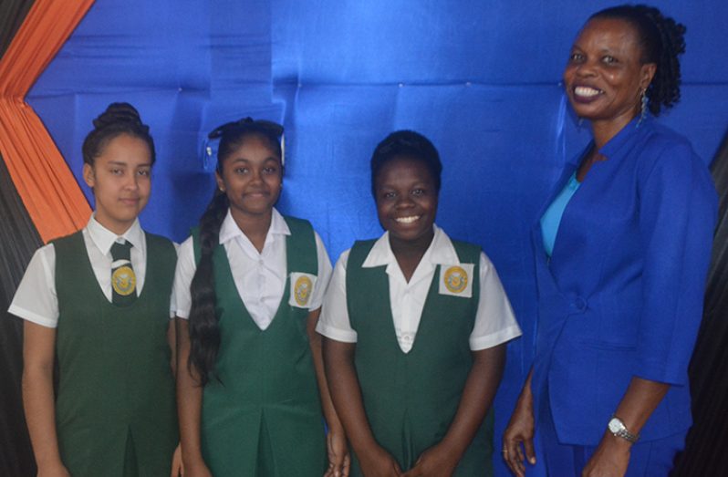 The champions! Anzale Gonsalves, Jessica Jagdeo and Kenasha Dey after being declared winners of the 2018 Region Four JOF Haynes Debating Competition