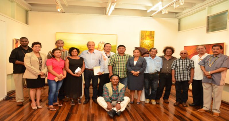 Indigenous People’s Minister Sydney Allicock; Minister within the Ministry of Indigenous People’s Affairs, Valerie Garrido-Lowe; Education Minister Dr Rupert Roopnaraine; Minister within the Ministry of Communities, Dawn Hastings; and George Simon with some of the Indigenous artists
