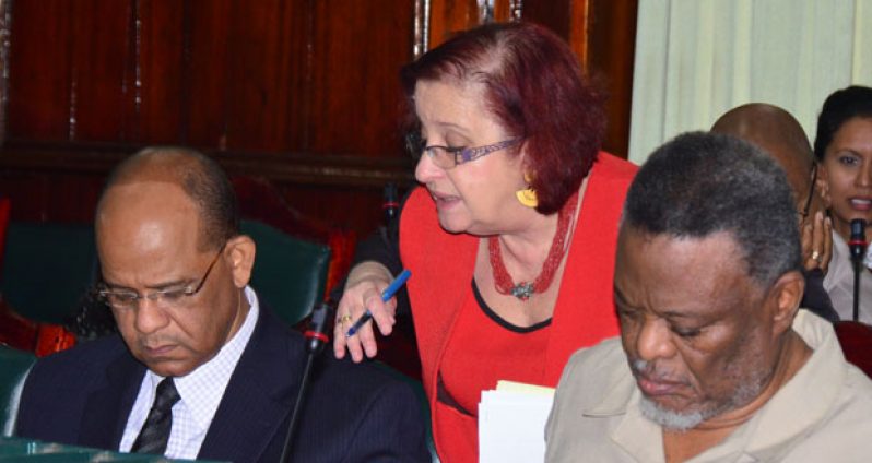 Government’s Chief Whip in Parliament Ms Gail Teixeira  with Home Affairs Minister Clement Rohee and Prime Minister Samuel Hinds, yesterday. (Adrian Narine photo)