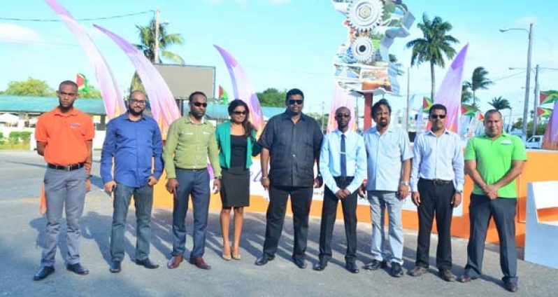 Tourism Minister (ag) Irfaan Ali (center) with corporate sponsors of GuyExpo 2014 (Adrian Narine photos)