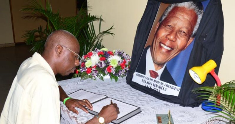 Lennox Canterbury was among those who signed the book of condolences for Nelson Mandela yesterday