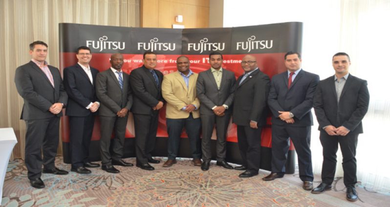 The Fujitsu IT team is in Guyana to re-introduce their products and services (Delano Williams photo)