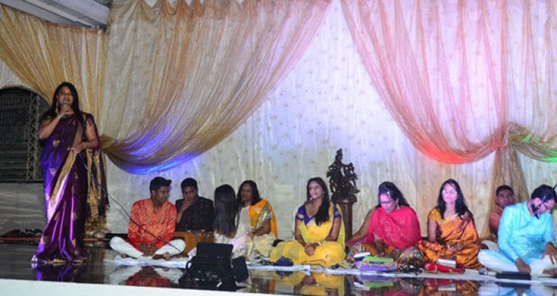 President of the Guyana Hindu Dharmic Sabha, Dr. Vindhya Persaud, with some of the devotees.