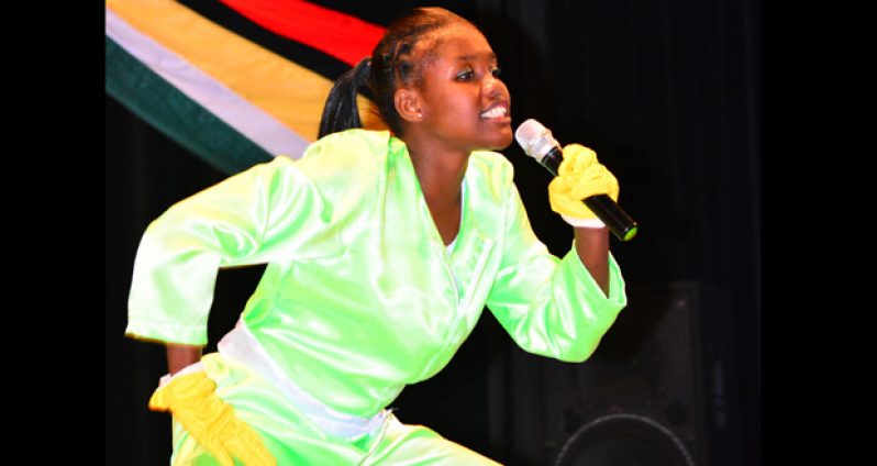Lead singer of Tutorial High School shows her class as the school clinched
the 14-17 age category Calypso competition when the finals were held at
the Cliff Anderson Sports Hall on Tuesday. The competition was part of the
Ministry of Education’s Children’s Mash Contest (Photo by Samuel Maughn)