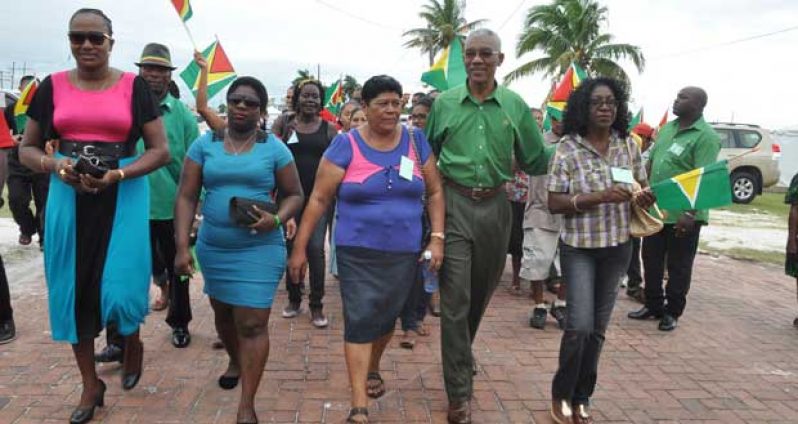 PNCR Leader Brigadier (rtd.) David Granger, being escorted into Congress Place for the 18th Biennial Congress’ opening ceremony (Delano Williams photo)