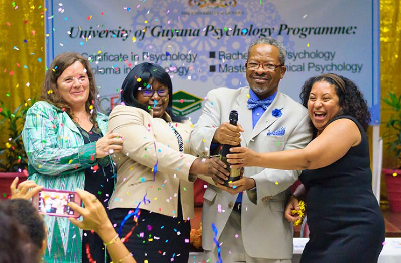 Minister within the Ministry of Public Health, Dr. Karen Cummings, launches UG's psychology programme alongside Vice-Chancellor of the University, Dr. Ivelaw Griffith, UNICEF Resident Representative, Sylvie Fouet and other members of the university. ( Photo by Delano Williams)