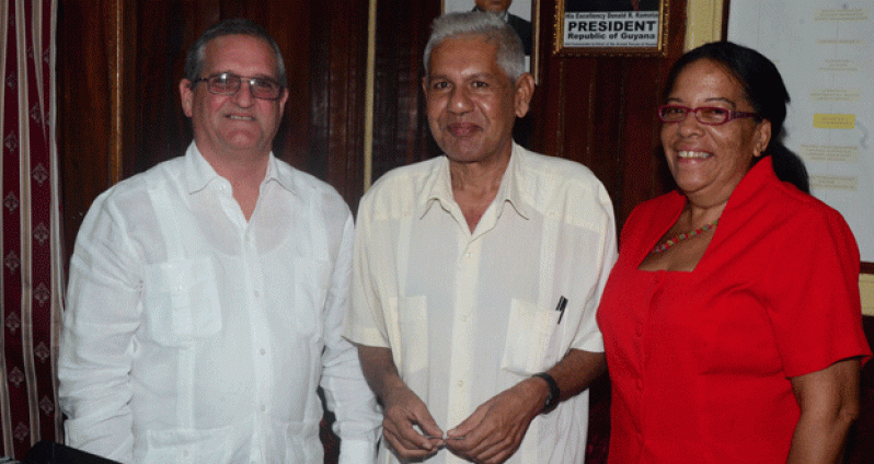 L-R Cuba’s Ambassador to Guyana, Mr. Julio Cesar Gonsalez Marchante, Acting Sunday Chronicle Editor, Chamanlall Naipaul and Economic and Commercial Counselor, Ms. Lic. Praxedes Louis Nordet during the courtesy call by the Cuban officials (Adrian Narine photo)