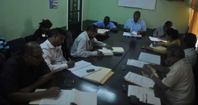 Labour Minister Dr. Nanda Gopaul chairs a meeting between the GuySuCo and GAWU representatives