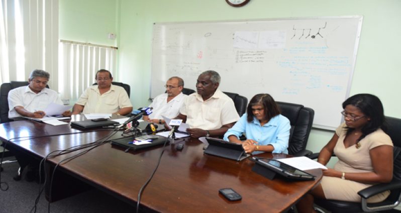 Minister Robeson Benn, centre, with GCCA and other stakeholder officials at yesterday’s press conference