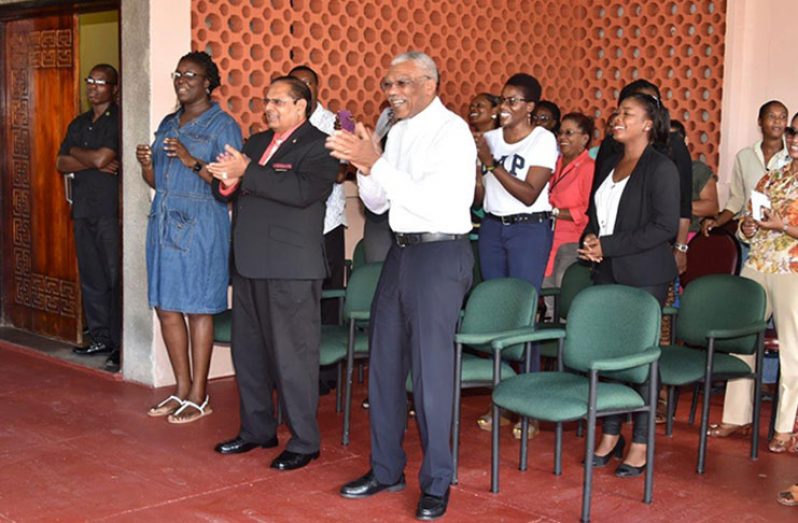 President David Granger, Prime Minister Moses Nagamootoo and staff of the Ministry of the Presidency joined with the choir to sing "We wish you a Merry Christmas'
​