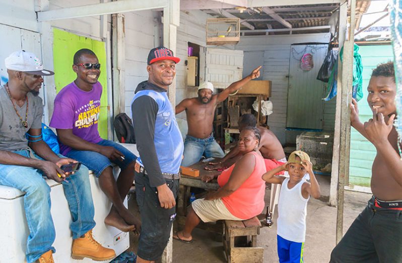 The residents of Broad and Lombard Streets engaged in a friendly game of dominoes