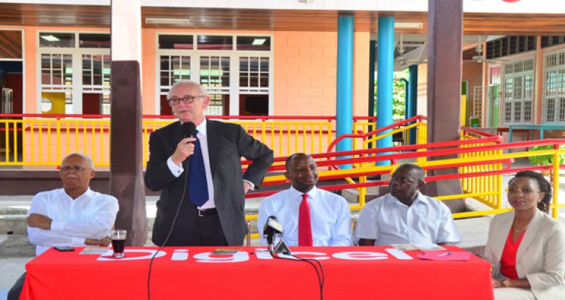 Executive member of the Board of Directors of Digicel Guyana, PJ Mara addresses the gathering yesterday flanked by other members of the head table