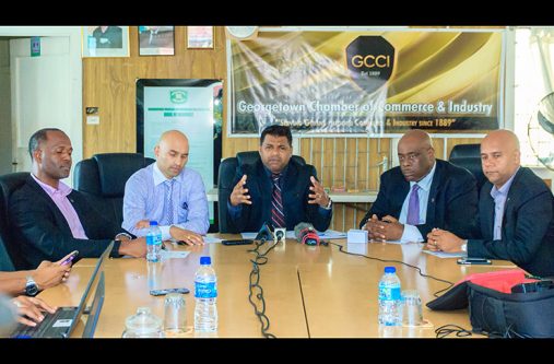 President of the Georgetown Chamber of Commerce and Industry (GCCI), Deodat Indar makes a point as other executive members of the body look on