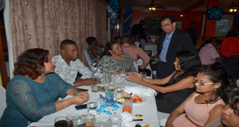 CEO of GT&T, Radha Krishna Sharma engaging some of the media operatives at the dinner