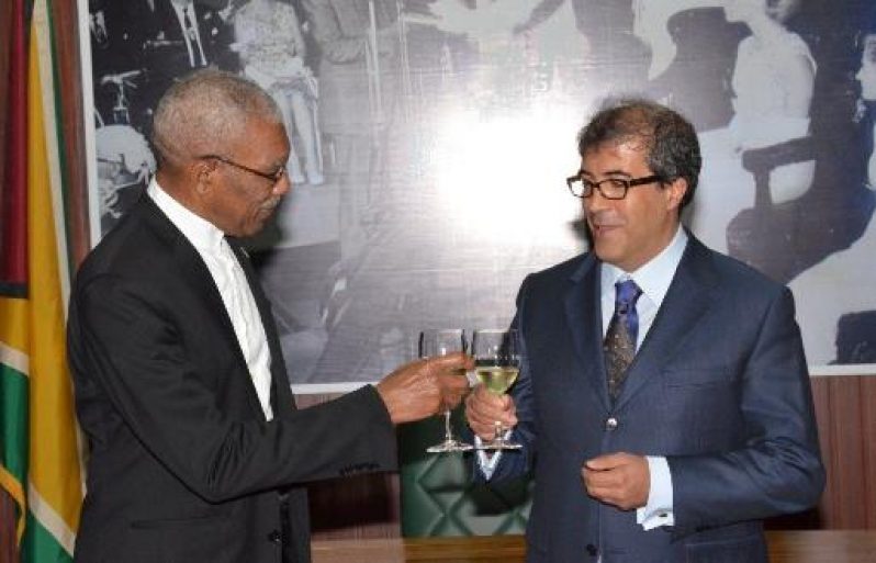 President David Granger shares a toast with Ambassador of Italy to Guyana, HE Silvio Mignano