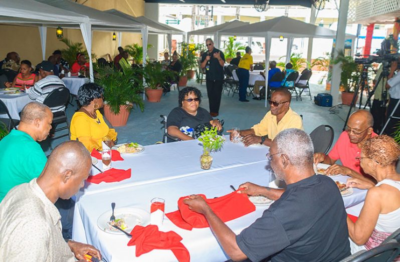 Captain Gerald Gouveia standing at center (rear) addressing Veterans at his Christmas Party on Friday
