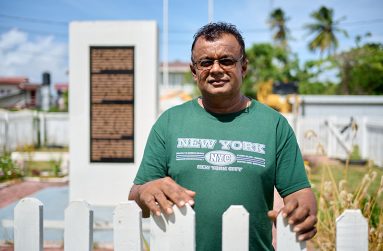 Chairman of Windsor Forest, Rajish Kadernauth standing next to the community’s chinese monument (Samuel Maughn photos
