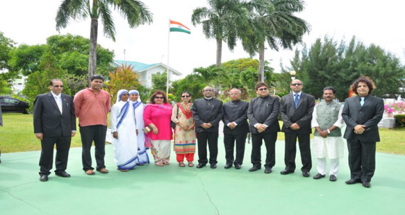 Indian High Commissioner Venkatachalam Mahalingam (centre) with others who took part in yesterday’s flag hoisting ceremony