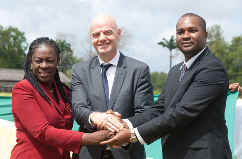 (L-R) Minister Nicolette Henry, Infantino and GFF President Wayne Forde
after the turning of the sod