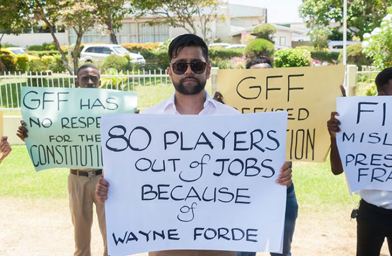 Protesters outside of the Pegasus Hotel yesterday