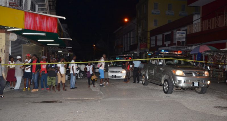 Police cordoned off the America Street area following the daring
robbery Tuesday evening (Delano Williams photo)