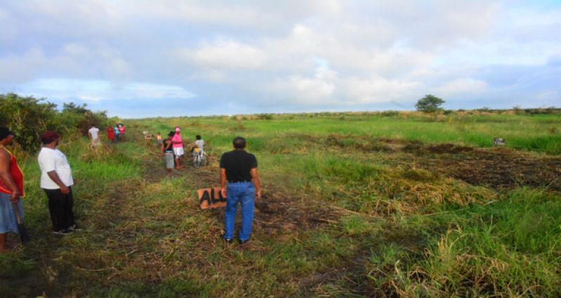 Residents in the backlands at ‘Grassfield,’ Mon Repos, East Coast Demerara, as they seek to acquire plots of land yesterday