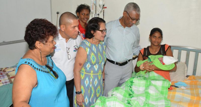 Meena Bisnauth cradles her Christmas miracle, little Lisa, the first baby born on Christmas Day at the Georgetown Public Hospital Corporation. Lisa was born prematurely, at 33 weeks, but is doing well
