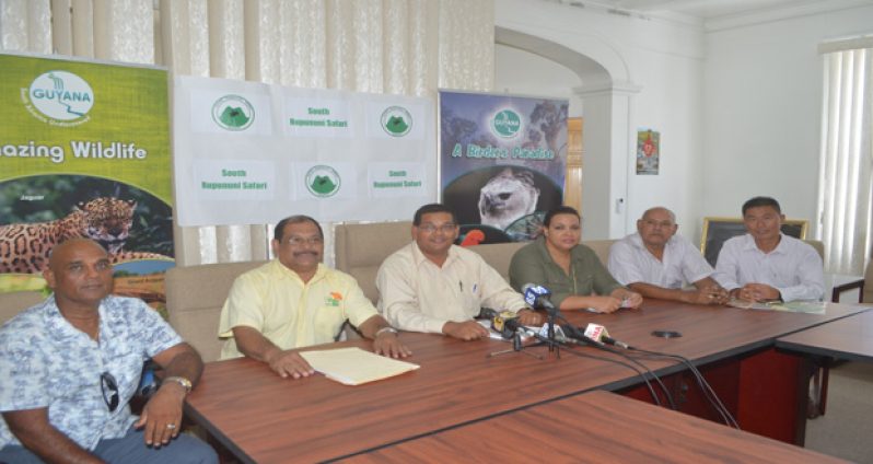 At the head table at the press conference yesterday are (second left) Head of the Safari Club Frank Singh and GTA head Indranauth Haralsingh (center), along with other members of the Safari Club (Photo by Cullen Bess-Nelson)