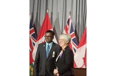Narine Dat Sookram poses with Lieutenant Governor of Toronto, Edith Dumont