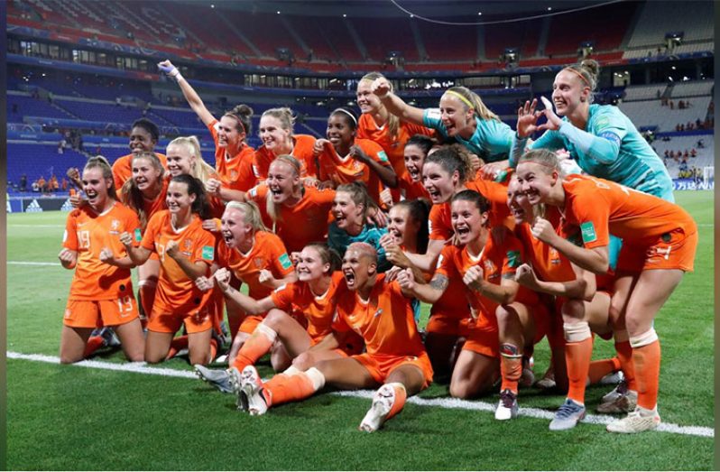 Players of the Netherlands celebrate winning the match at Groupama Stadium, Lyon, France. (REUTERS/Bernadett Szabo)