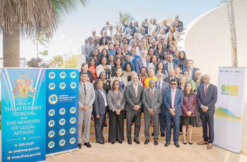 DV Minister of Human Services and Social Security, Dr. Vindhya Persaud and Attorney General and Minister of Legal Affairs, Mohabir Anil Nandlall, SC with other officials at the two-day High-Level Symposium to Advance State Responses to Address Domestic Violence in the Caribbean, held in Barbados