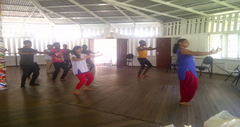Choreographer Roshini Boodhoo teaching participants Indian Bangra moves