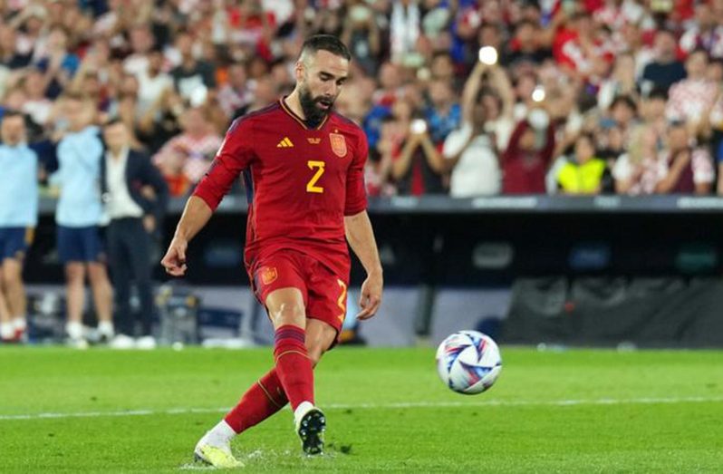 Dani Carvajal chipped in the winning penalty to secure Spain's shoot-out win after disappointment at the World Cup