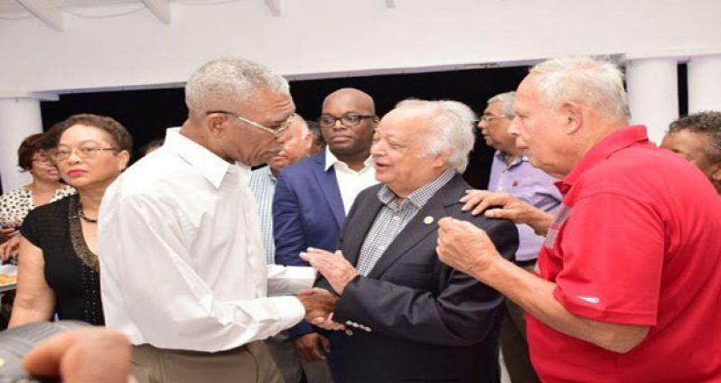 President David Granger sharing a light moment with Guyanese-born Sir Shridath Ramphal, who now lives in Barbados; and Mr. Fran Da Silva (right) during a cocktail reception at the home of Guyana’s Consul-General, Mr. Michael Brotherson