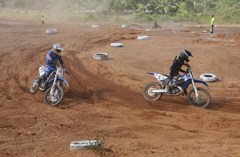 David De Nobreiga in chase of Nickoce Wilson at the Battle of Champions Motocross race on Sunday(Stephan Sookram photo)
