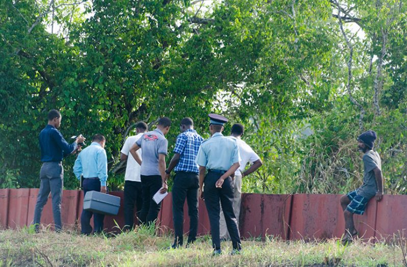 Police from the Criminal Investigations Department and others at the area where Forrester’s body was discovered