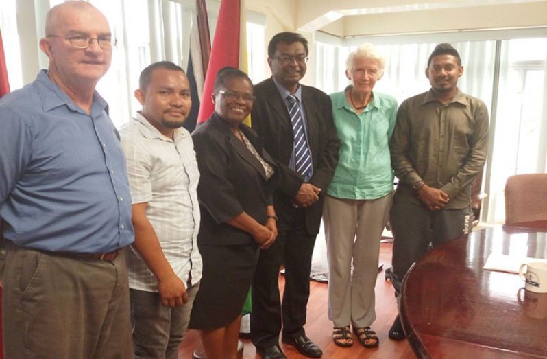 Minister Ramjattan (third right), Sabine McIntosh Director Deaf Association of Guyana (second right), Beverly Pile (third left)