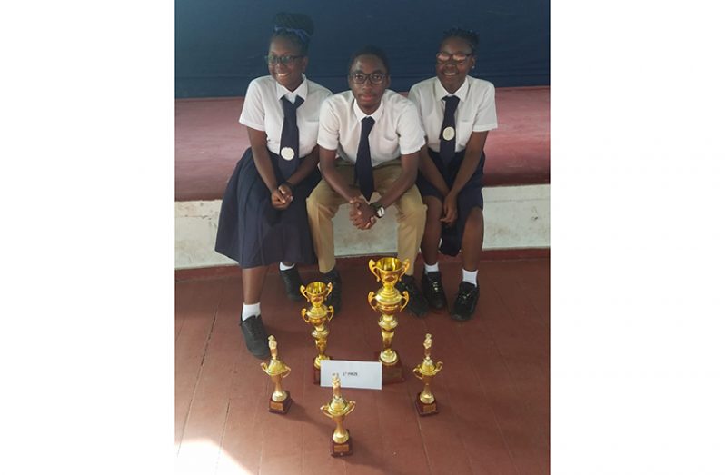 The Hope Secondary debating team, (from left) Shanecia Simon, Joshua Blackman and Shoquilla Threlfall