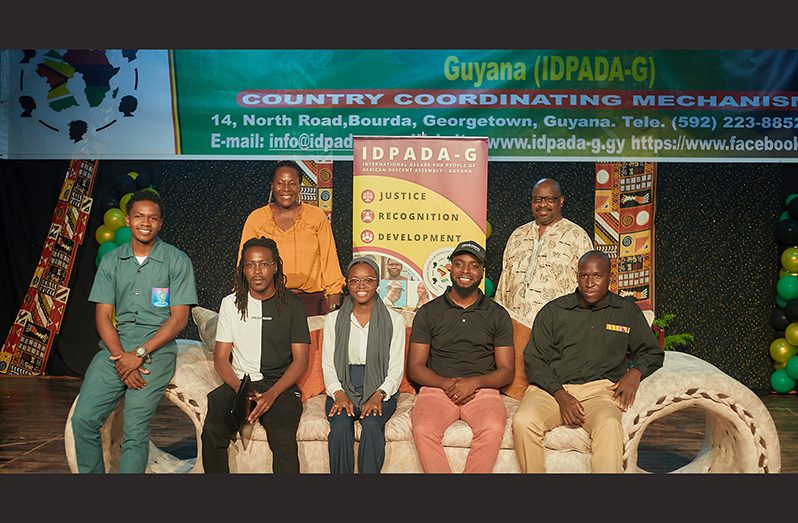 Top five winners (L-R seated:  Clinton Samuels of COBBEC Vision, Delon Simpson of Kukki Aquaculture,  Earlecia Hieronymo of Khayr Organics, Brian Smith of Dragonfly Geospatial Aerial Productions and Jermaine Hall of Country Boy Farming Supplies) of IDPADA-G’s Invest-a-thon Pitch Competition 2022 with two of the judges, Ms. Ndibi Schwiers and Professor Leyland Lucas (Photos courtesy of IDPADA-G)