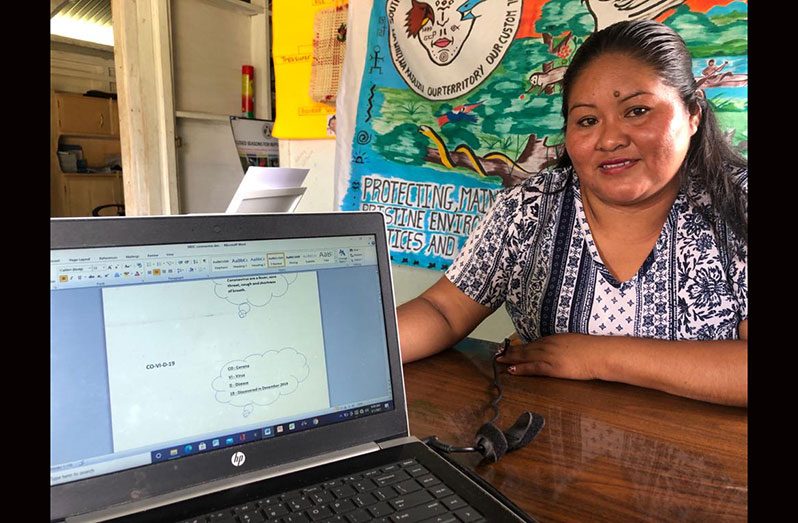 Public Relations Officer (PRO) of the SRDC, Immaculata Casimero, shows some of the messages the Council crafted to distribute to the villages so that the villagers would be able to understand the dynamics of COVID-19 (Vishani Ragobeer photo)