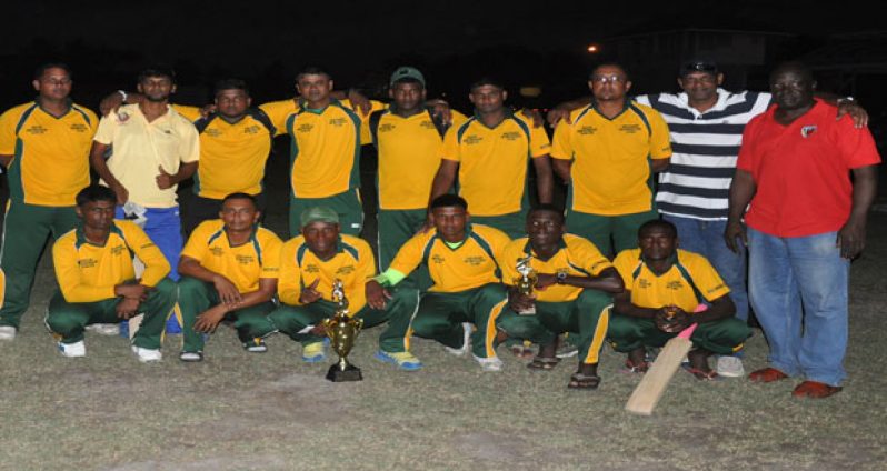 Members of the victorious Demerara ‘A’ team proudly display their trophies with officials of the GSL and GSCL Inc., after defeating Berbice in the final of the first leg.