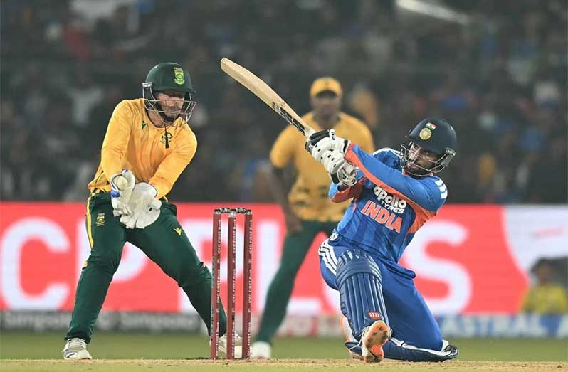 Tilak Varma deposits one over deep square leg•Dec 09, 2025•AFP/Getty Images